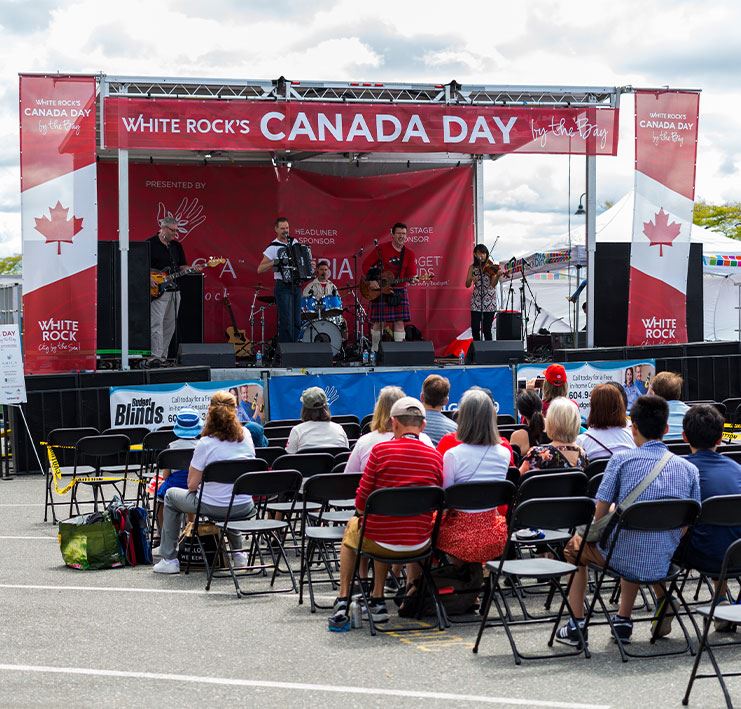 Performers on stage at Canada Day by the Bay - Call for Entertainers