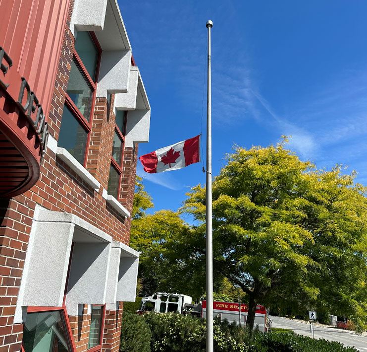 Canada flag at half-mast infront of Fire Hall