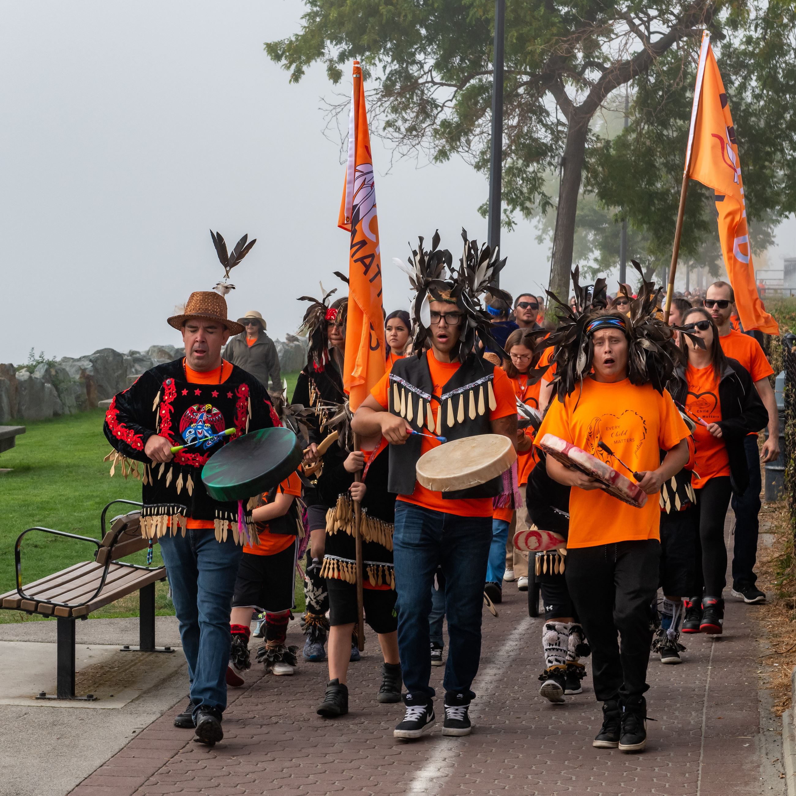 Semiahmoo First Nation and community supporters walking the White Rock Promenade 