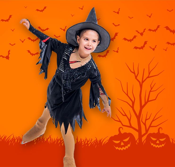 girl dressed as witch ice skating