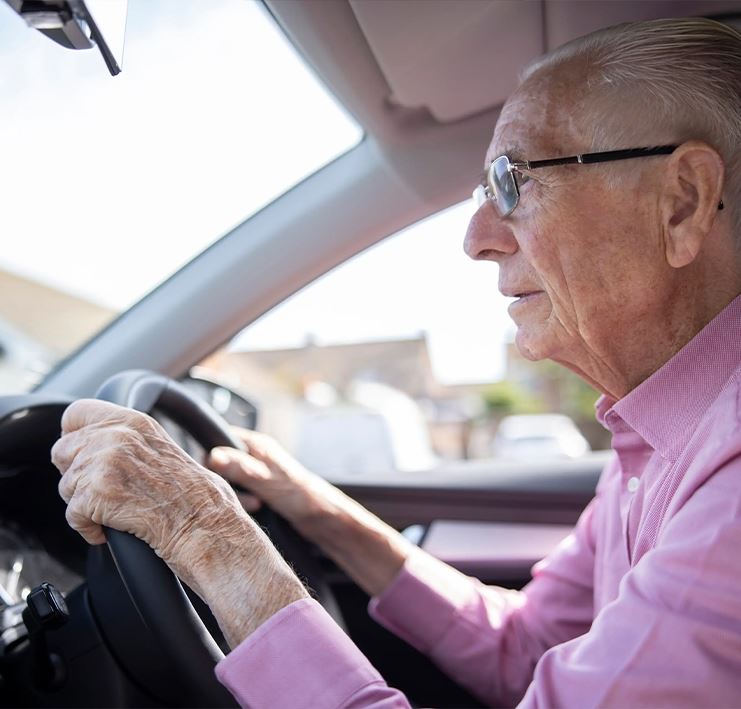 male senior driving