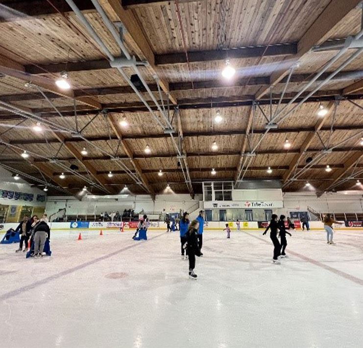 People ice skating at Centennial Arena