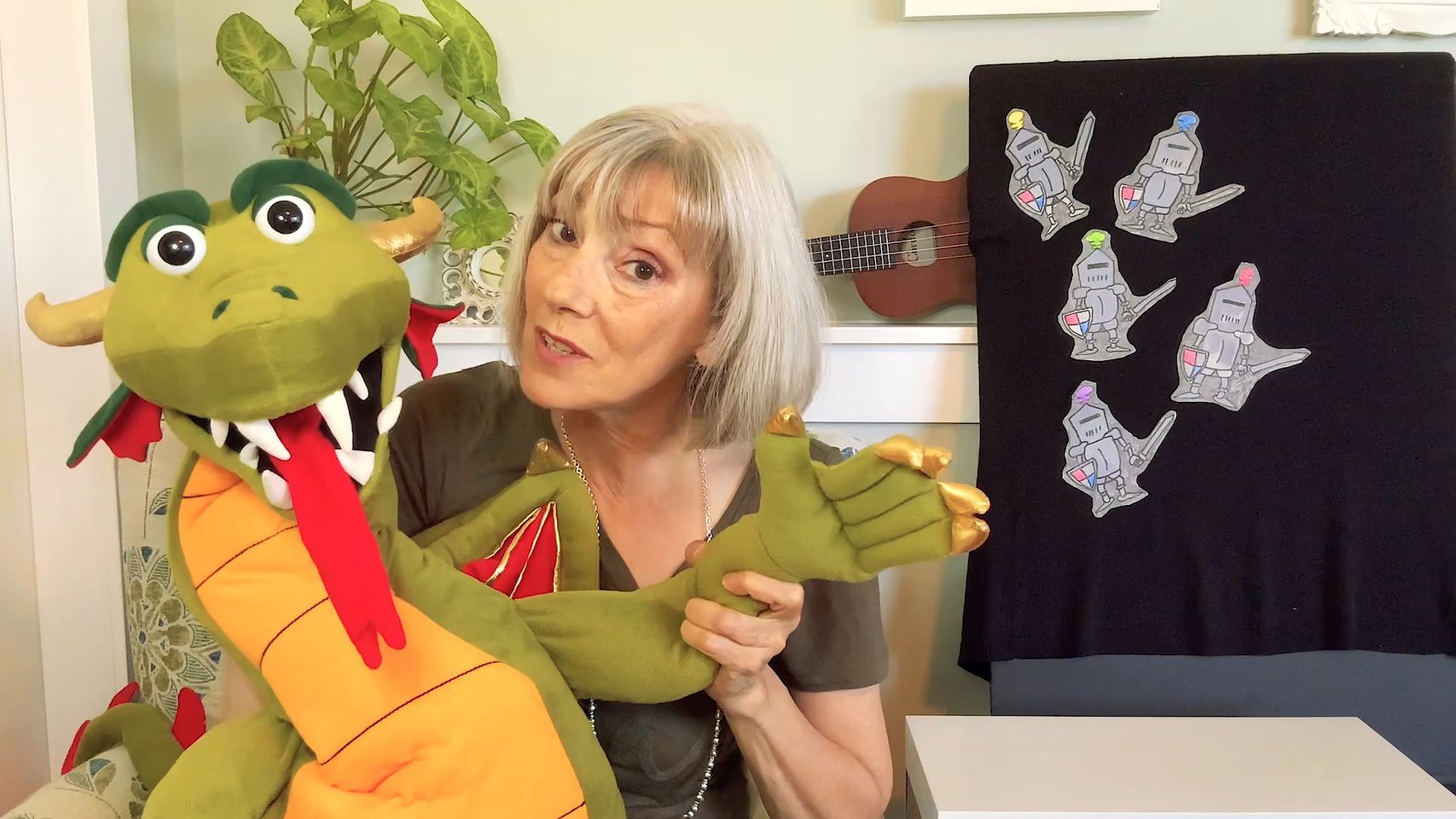 Teacher with dragon puppet